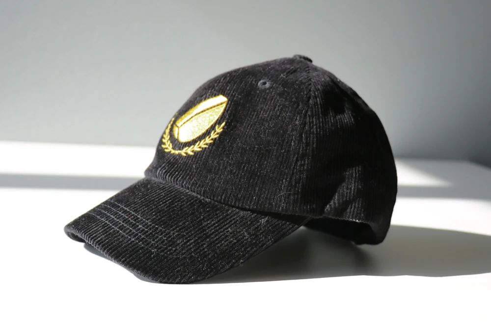 Casquette en velours noir brodée or Championnats du monde de la raclette