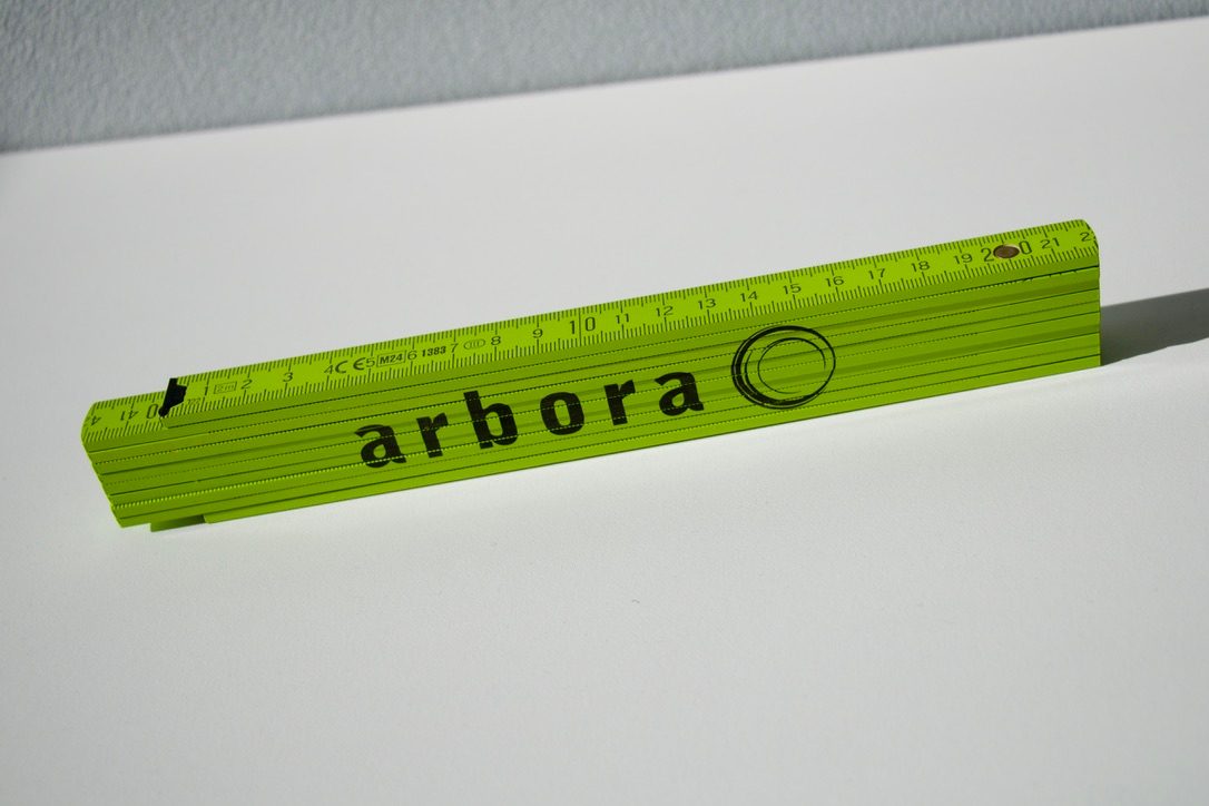 metre-pliant-arbora Mètre pliant vert imprimé Arbora, objet publicitaire pour le bâtiment
