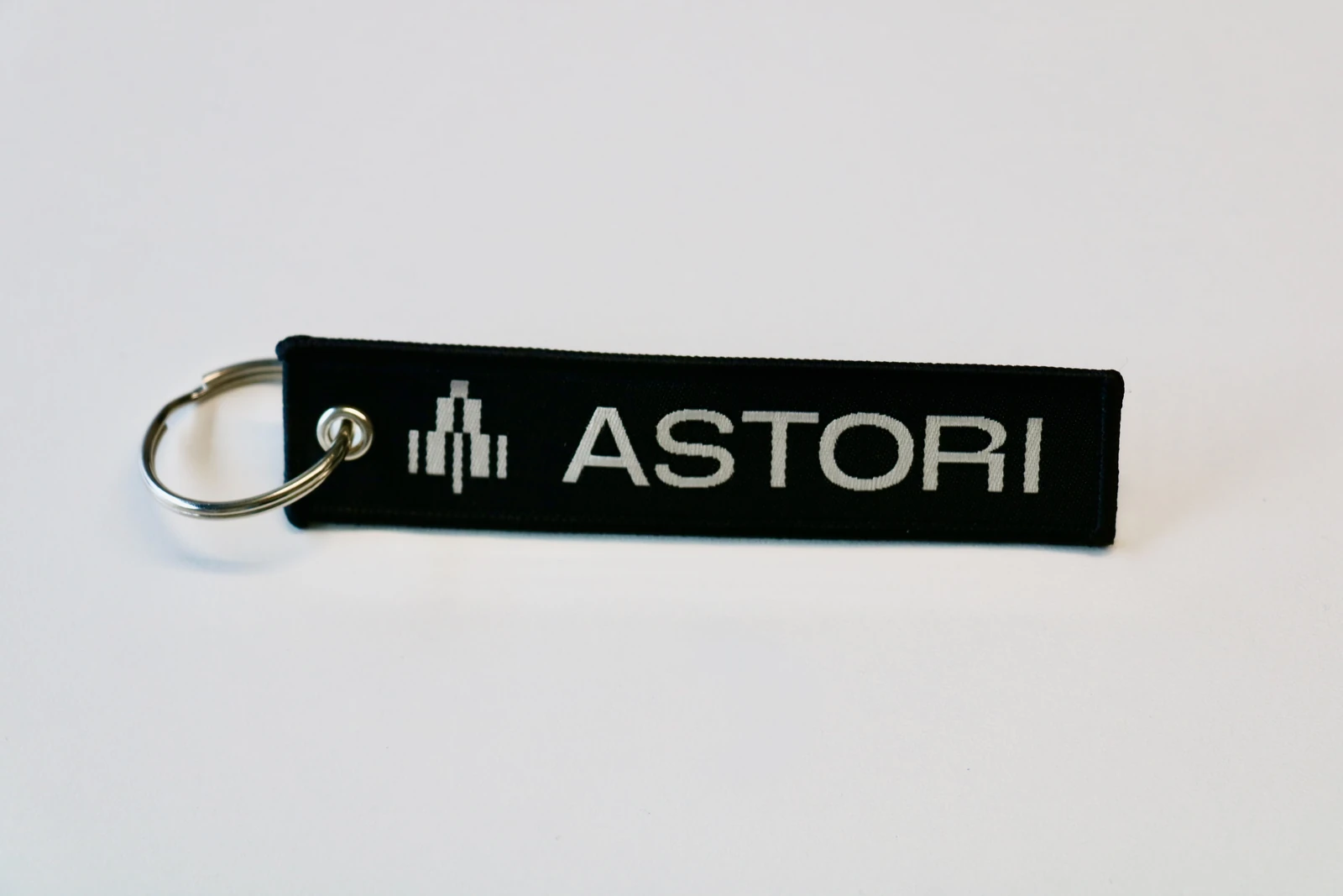 porte-cles-tisse-astori-texorio-martigny Porte-clés tissé noir personnalisé Astori